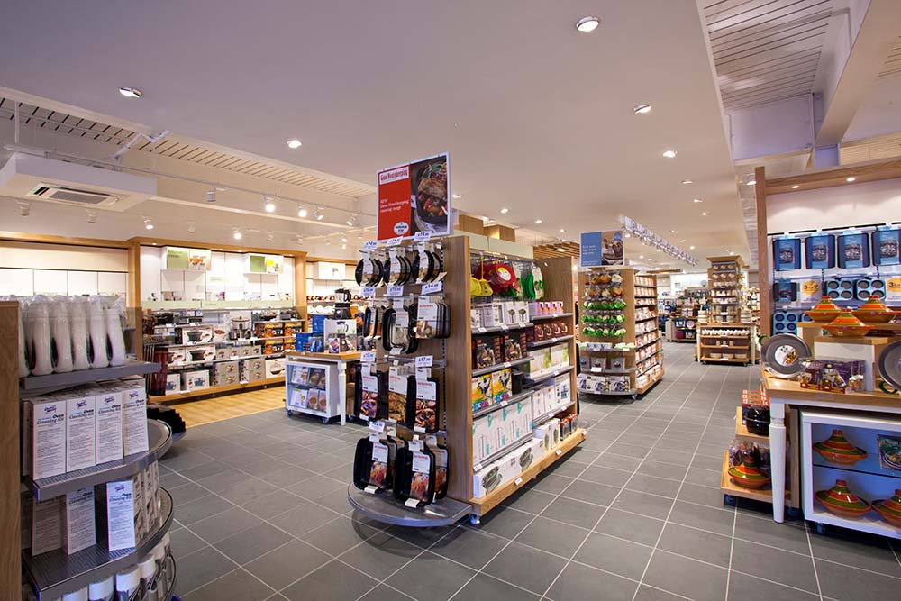 Wooden gondola shelving in a retail store 