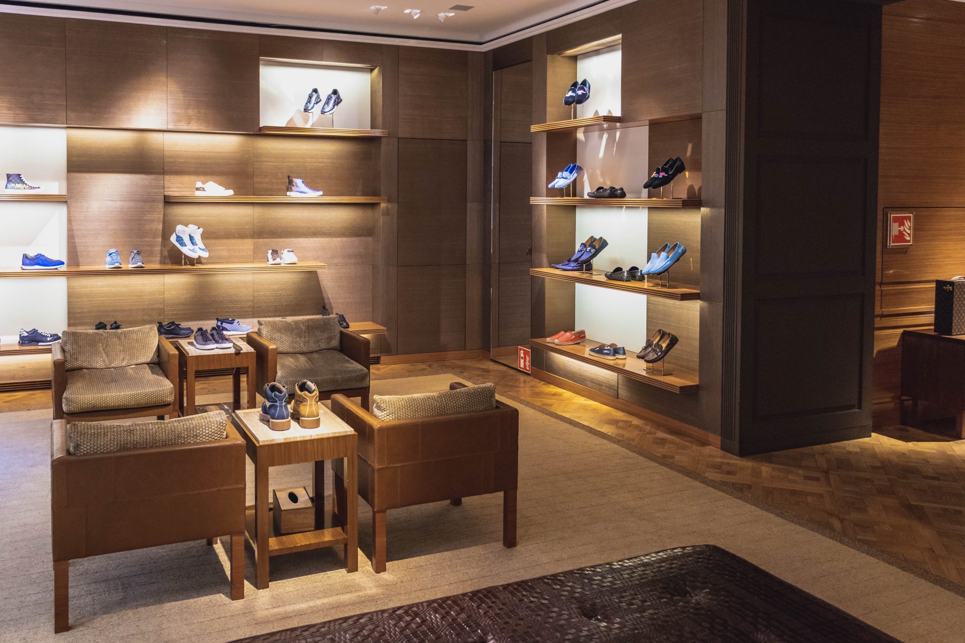 Shoes displayed on a table in a shop
