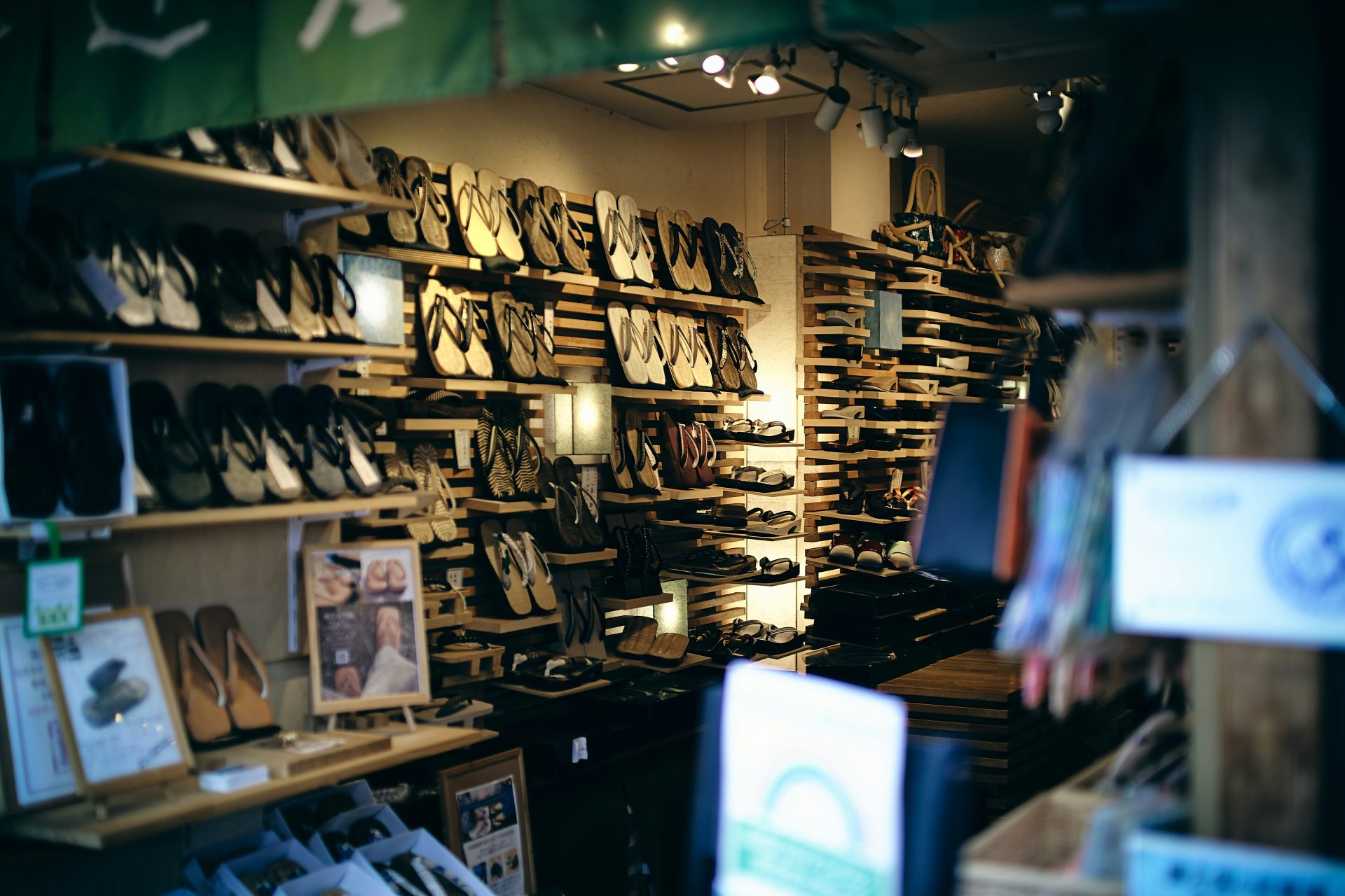 Shoes on a slatstrip wall display