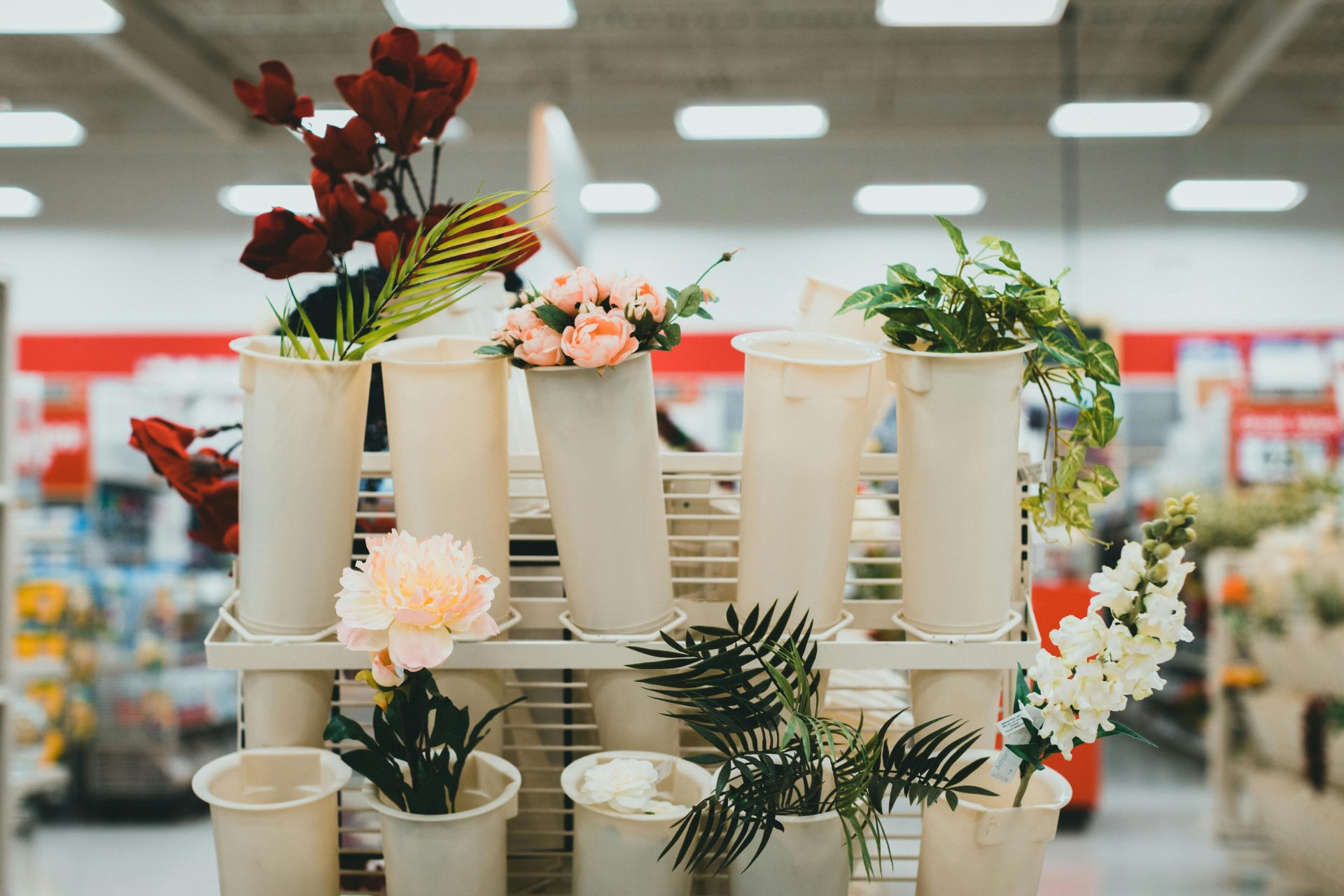 A display of flowers in a retail setting