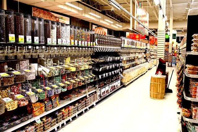 Snacks and treats in dispensers in a supermarket